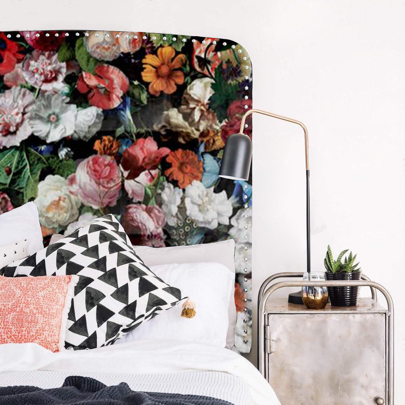 Our simple Curved Rectangle headboard has been given a boost with our bold Flower Bomb printed velvet. It is finished with a row of silver hit-and-miss studs around the edge. As these are all made to order in NZ, please allow 6-8 weeks for production.